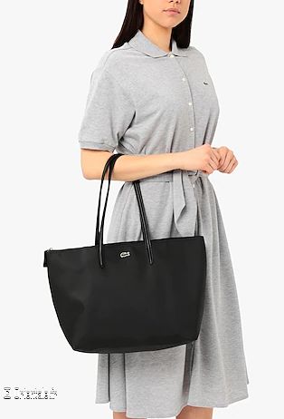 Sac Lacoste noir avec fermeture clair