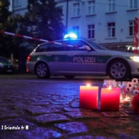 Sc�ne d'hommage aux victimes du terroriste somalien avec police allemande