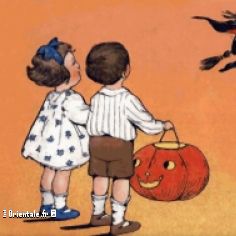 Des enfants regardent une sorcire le jour de Halloween